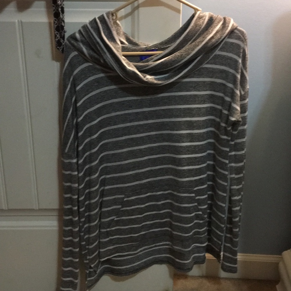 Long sleeve swoop neck shirt.